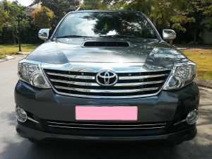 Tôi cần bán Toyota Fortuner đời 2016, máy dầu, số sàn, xe cọp zin, màu xám