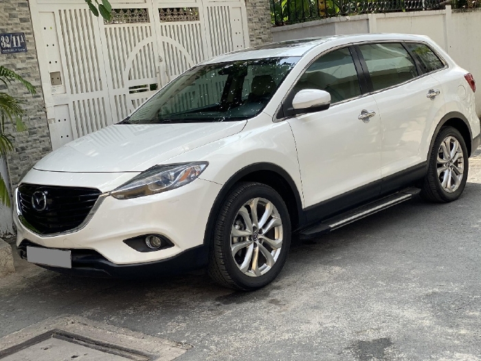 Gia đình cần bán Mazda CX9  tự động 2014 màu trắng bản full rất mới