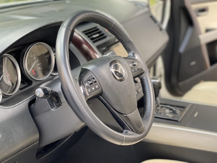 Gia đình cần bán Mazda CX9  tự động 2014 màu trắng bản full rất mới