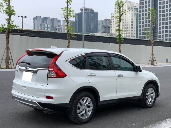 Gia đình cần bán xe Honda Crv 2015, bản 2.0, màu trắng còn mới ken