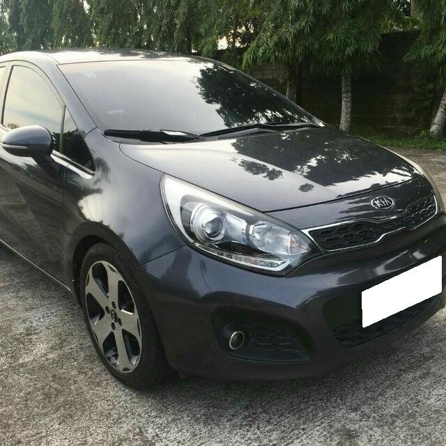 Nhà cần bán Kia Rio 2014 AT hatchback bản full màu Xám