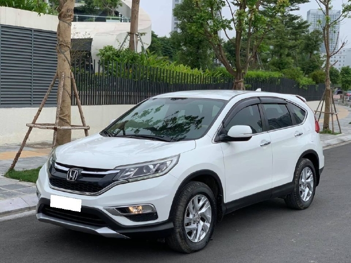 Gia đình cần bán xe Honda Crv 2015, bản 2.0, màu trắng còn mới ken
