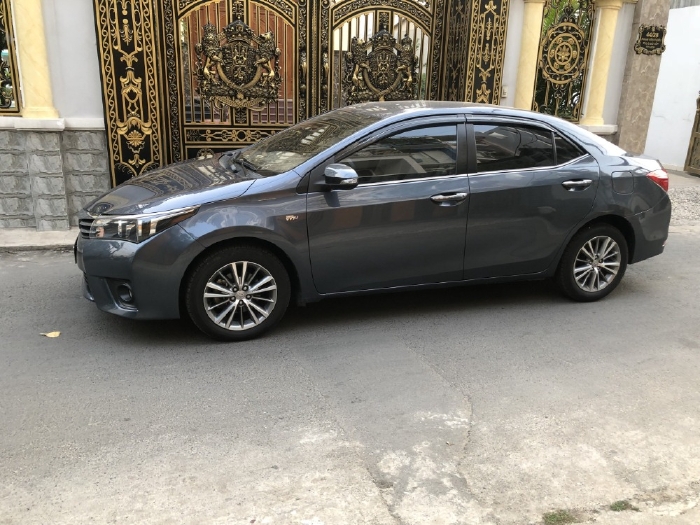 Mình bán Toyota Altis 2015, tự động 1.8, phom mới, màu xám xanh