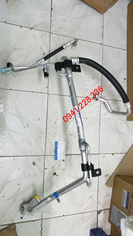 97775B4100 Cụm ống ti ô điều hòa Hyundai i10